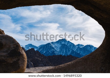Looking through a rock arch, the eastern slopes of the Sierra Nevada Mountains, near Mount Whitney.