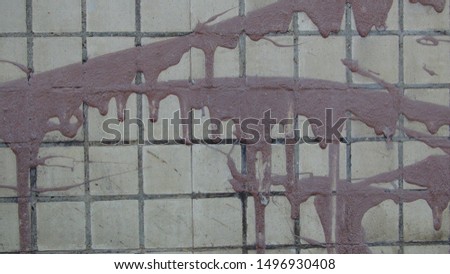 texture and background of old and small tiles on the facade of the building
