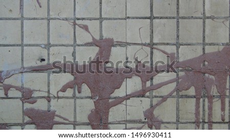 texture and background of old and small tiles on the facade of the building