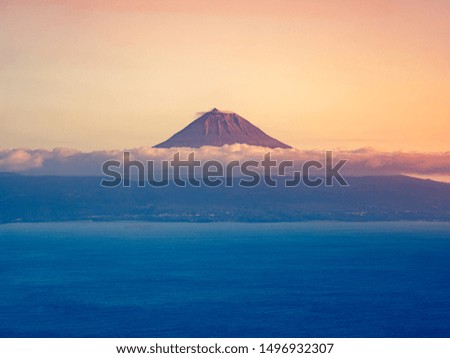 Image of the volcano mountain of pico in beautiful sunset colors, Azores