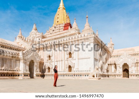 Horizontal picture of posing in front of Ananda Temple, a landmark of the national park of Bagan, Myanmar