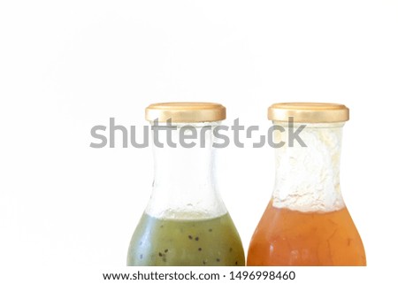 Fruit sauce in a clear bottle