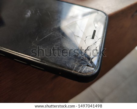 cracked shattered smartphone screen broken glass