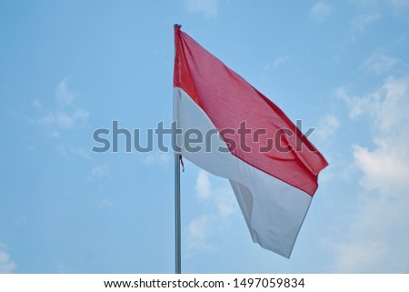 the red and white flag is the flag of the unitary Republic of Indonesia.