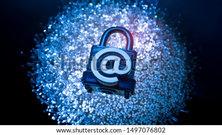 email signs on lock with Fiber optics background