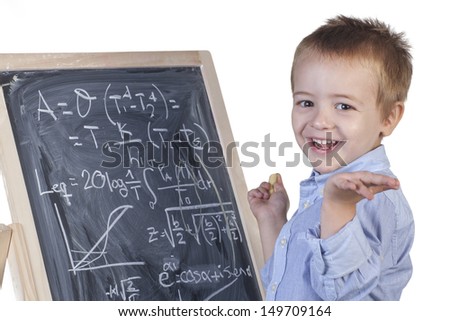 Smiling boy with math's blackboard