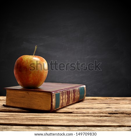 apple and worn book 