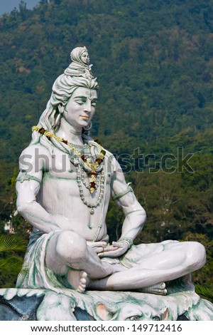  Shiva, hindu idol on the river Ganges, Rishikesh , India