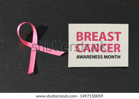 healthcare and medicine concept. pink breast cancer awareness ribbon.