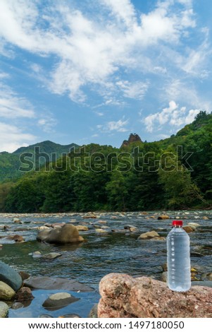 Plastic bottle with clean drinking water.