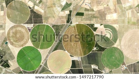 life circles, allegory, tribute to Picasso, abstract photography of the Spain fields from the air, aerial view, representation of human labor camps, abstract, cubism, abstract naturalism, Royalty-Free Stock Photo #1497217790
