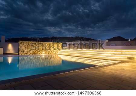 Beautiful Night Scene with Illuminated Swimming Pool. High Resolution Image.