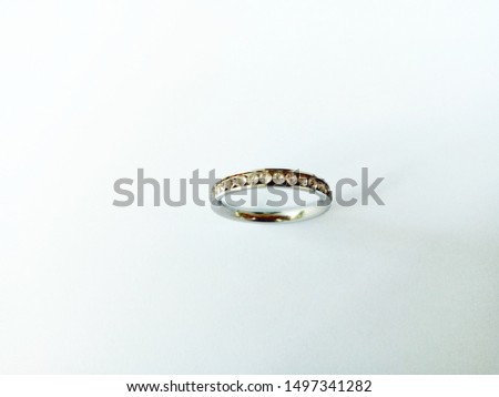 Close-up beautiful silver ring on white background
