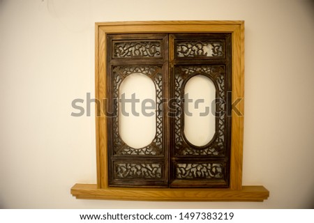 Close up shot of the decorative wooden window on the wall in a tea house and the space can be used for text.