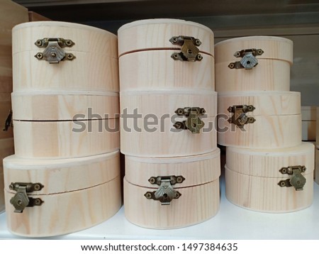 many wooden boxes in shelves on shopping mall