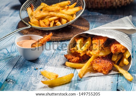 Fish & Chips served in the newspaper Royalty-Free Stock Photo #149755205
