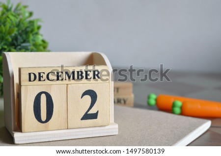 December 2, Appointment date with number cube design.