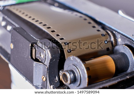Old vintage film camera close up isolated