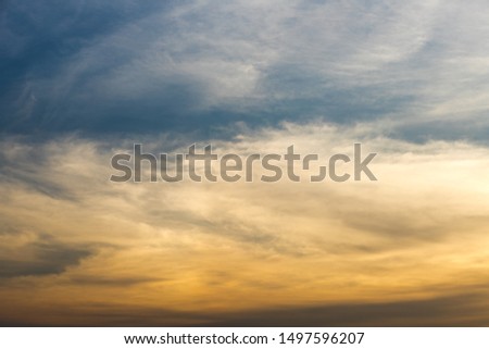 Beautiful images of golden skies at sunset and gray skies as if there were thunderstorms.