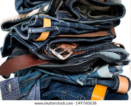 Stack of Jeans in Various Washes close up