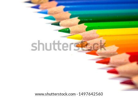Many color pencils isolated on white background with copy space for text.Close up.
