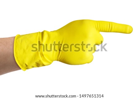 male hand in yellow glove points index finger