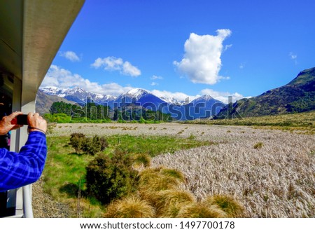 New Zealand, South Island, on the Transalpine train over the  Arthur’s Pass from Wellington to Mount Cook Village. Royalty-Free Stock Photo #1497700178