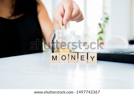 the future of Finance, business banking and financial concept. Housewife sitting at the table and leads the calculation of Finance, Economics.