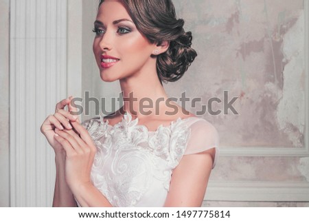 Wedding dress in Paris. Bride in a luxury apartment in a wedding dress.