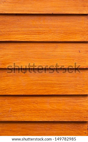 Brown wood panels for background.