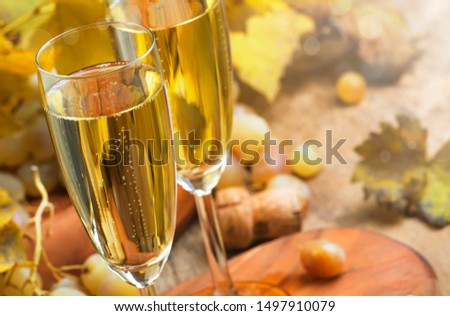 Champagne In Glasses, Grapes With Vine, Vintage Wood Background, Selective Focus