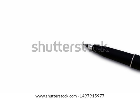 Black pen on a white sheet isolated on white