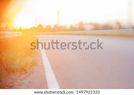Blured sunset road. Warm Background