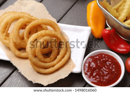 Onion Rings with ketchup on cartoon