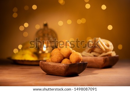 Deepa with sweets decoration for Diwali. Royalty-Free Stock Photo #1498087091