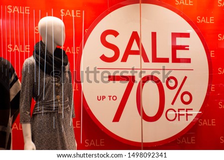 70% off sales promotion on retail shop display window. Black Friday, Clearance, Mega sale