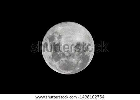 Full moon on black background.
