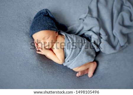 Cute sleeping newborn baby boy Royalty-Free Stock Photo #1498105496