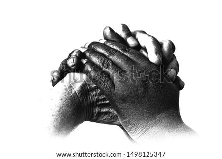 This picture of the black and white hand signify the concept of reconciliation and closeness. Reconciliation is the most important Biblical concept.