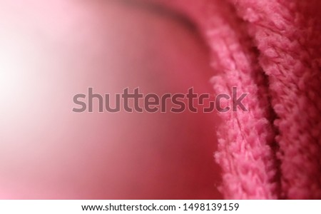 Abstract pink cloth background with texture fabric is satin and chiffon fabric can be used for display or montage of your products. Copy space for soft background