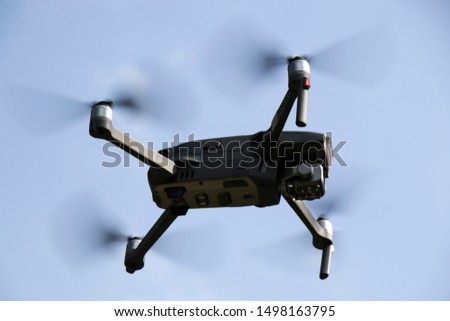Drone against the blue sky. 