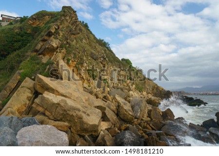 Photography of the breathtaking cliff. Atlantic ocean in Bay of Biscay near Bilbao in Basque Country in summer day. High resolution photo.
