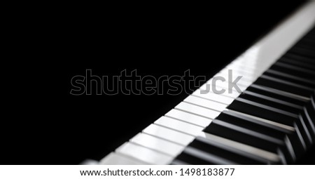 Piano and Piano keyboard with black backgrounds.