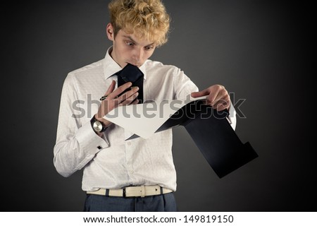 office worker in amazement looking at the document