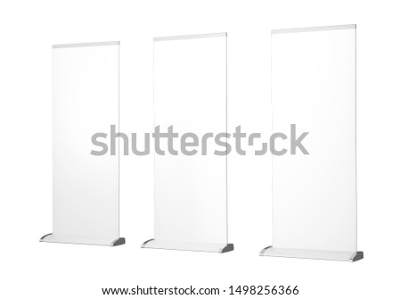 Roll up banner stand isolated on white background isolated with clipping path. empty white show display mock up for presentation or exhibition your product. 3d illustration