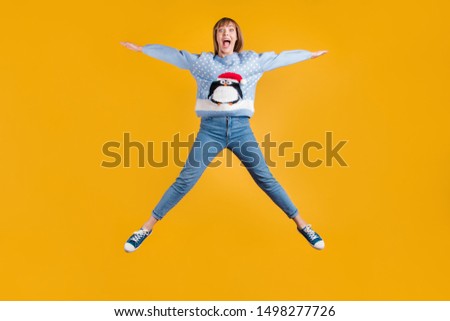 Omg I can fly! Full body photo of pretty funky comic joking screaming enjoying life having good mood hipster student stretching legs and arm to the sides in star shape isolated vivid color background