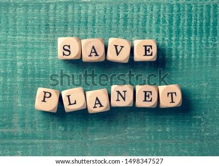 Letter cubes with word save planet. Environment concept.