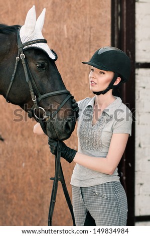 portrait woman with horse on hazel background