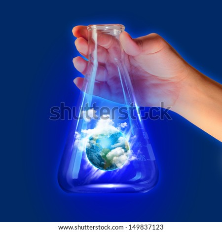 Image of earth planet in test tube. Ecology concept. Elements of this image are furnished by NASA