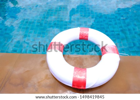 life preserver on swimming pool background